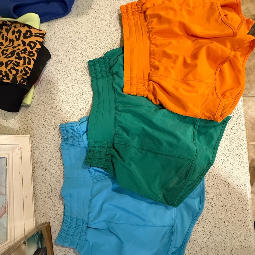 lululemon athletica Orange, Green, and Blue Athletic Hotty Hot Shorts $25/ short